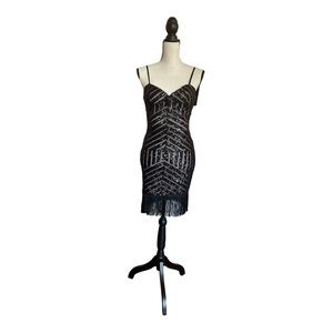 Xscape black and nude cocktail dress
Size:4